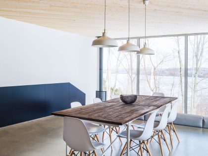 A Beautiful and Luminous Home Perched on the Snowy Terrain in Mansonville, Canada by MU Architecture (11)