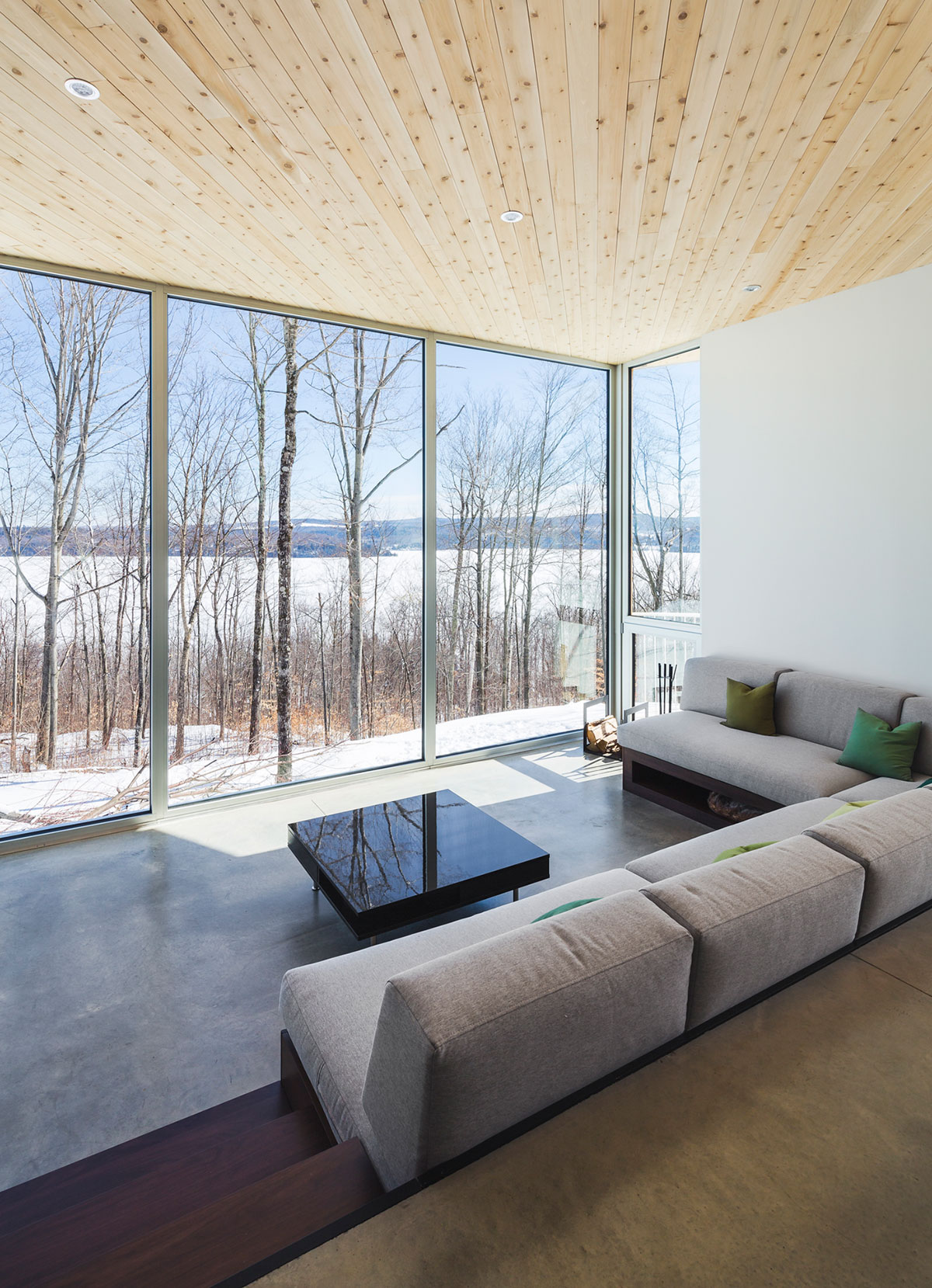 A Beautiful and Luminous Home Perched on the Snowy Terrain in Mansonville, Canada by MU Architecture (3)