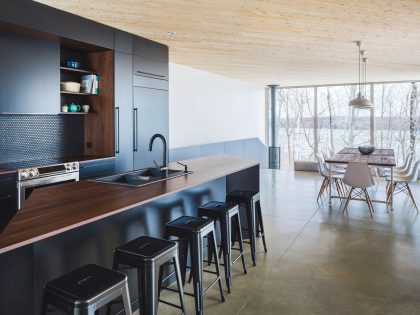 A Beautiful and Luminous Home Perched on the Snowy Terrain in Mansonville, Canada by MU Architecture (8)