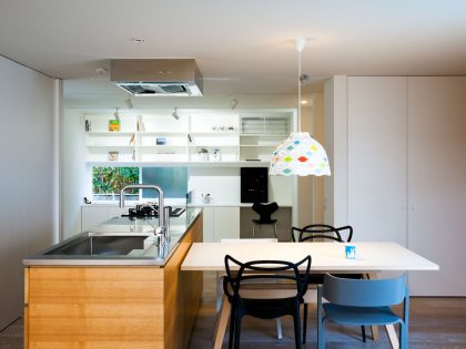 A Colorful Contemporary Home with Splashes of Bold Accents in Nagoya by Atelier Tekuto (10)