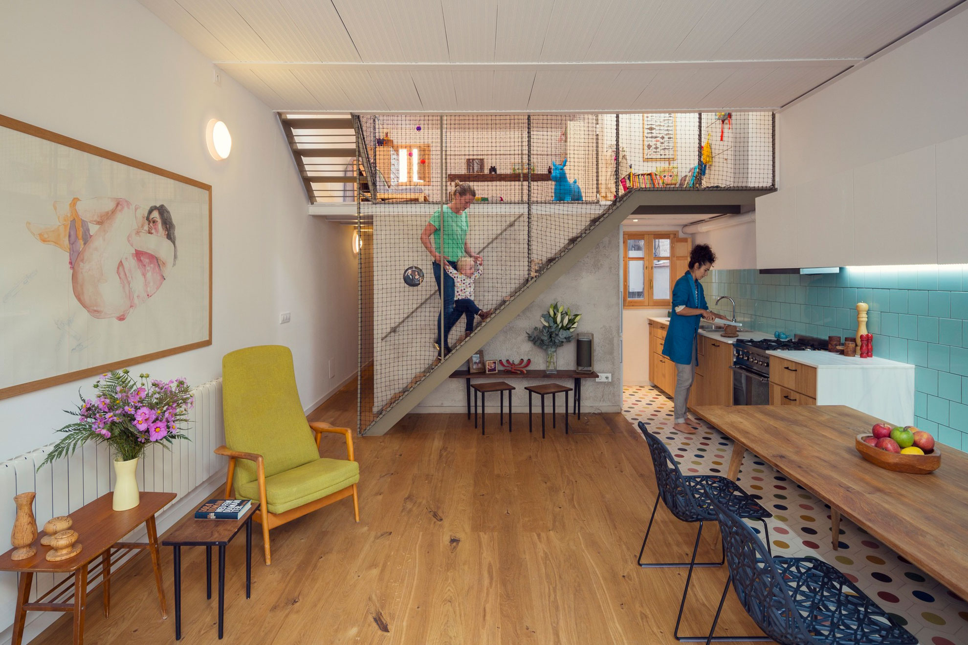 A Colorful and Playful Row Home Separated by Stairs and Mesh Partitions in Barcelona, Spain by Nook Architects (1)
