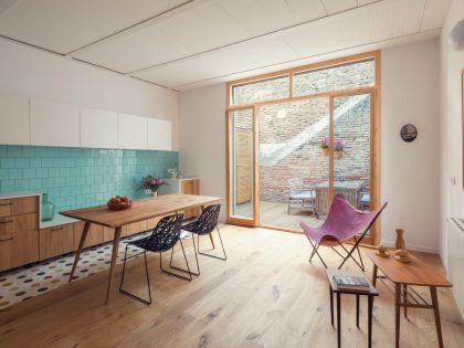 A Colorful and Playful Row Home Separated by Stairs and Mesh Partitions in Barcelona, Spain by Nook Architects (3)