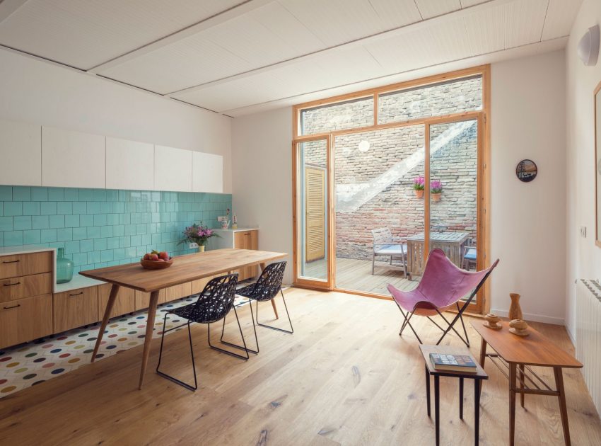 A Colorful and Playful Row Home Separated by Stairs and Mesh Partitions in Barcelona, Spain by Nook Architects (3)