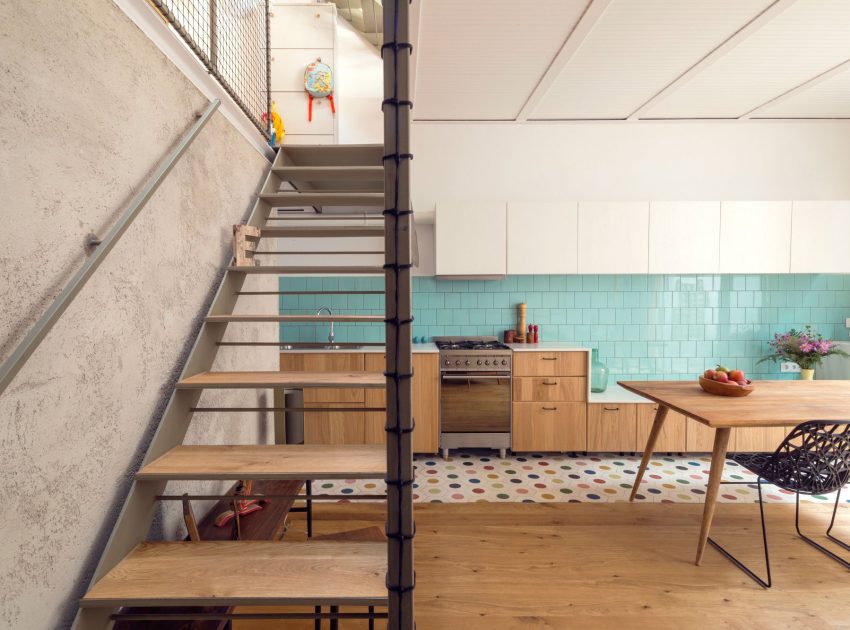 A Colorful and Playful Row Home Separated by Stairs and Mesh Partitions in Barcelona, Spain by Nook Architects (4)