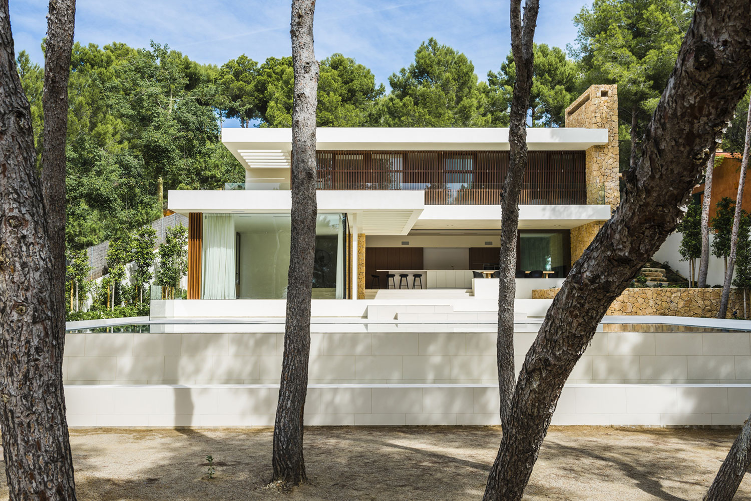 A Playful and Elegant Contemporary Home Formed by Overlapping Canopies in Spain by Juma Architects (1)