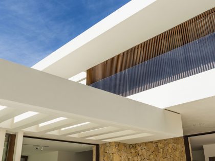 A Playful and Elegant Contemporary Home Formed by Overlapping Canopies in Spain by Juma Architects (10)