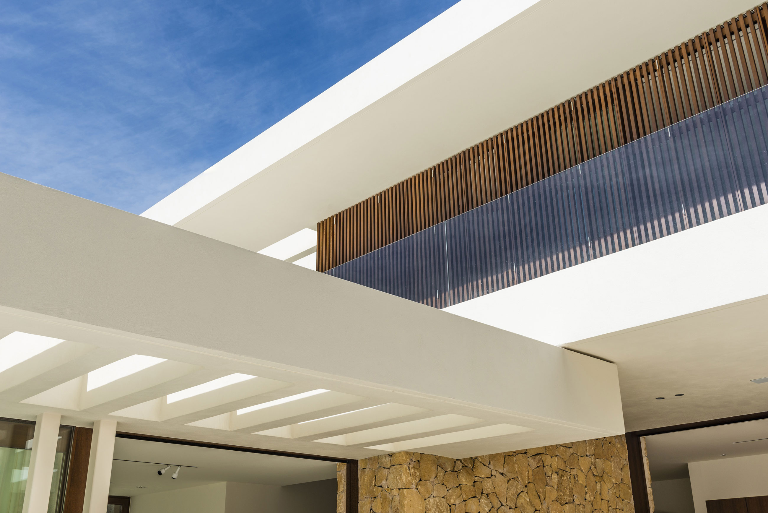 A Playful and Elegant Contemporary Home Formed by Overlapping Canopies in Spain by Juma Architects (10)