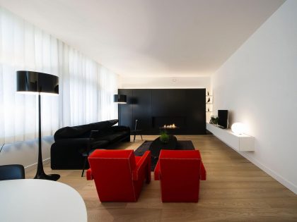 A Contemporary Apartment with Shades of Red and Black Furniture in Mortsel, Belgium