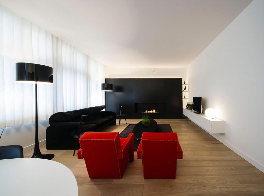 A Contemporary Apartment with Shades of Red and Black Furniture in Mortsel, Belgium by Filip Deslee (1)