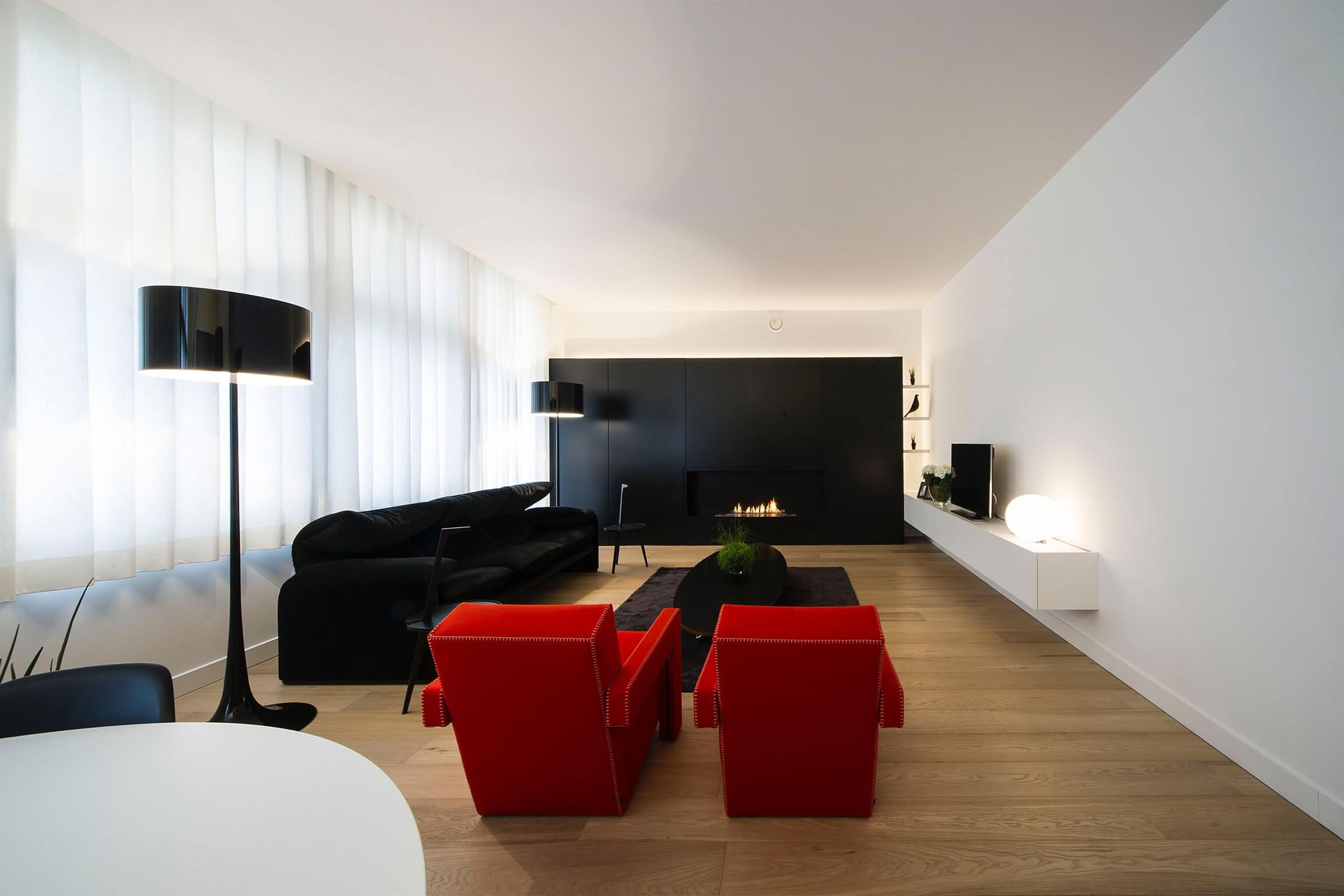 A Contemporary Apartment with Shades of Red and Black Furniture in Mortsel, Belgium by Filip Deslee (1)