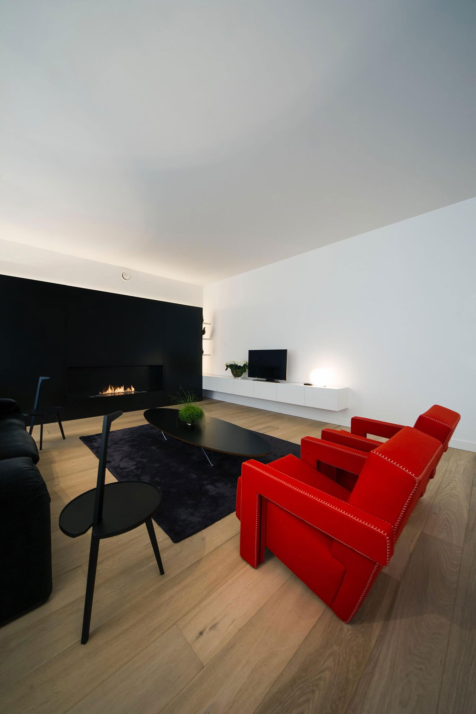 A Contemporary Apartment with Shades of Red and Black Furniture in Mortsel, Belgium by Filip Deslee (2)