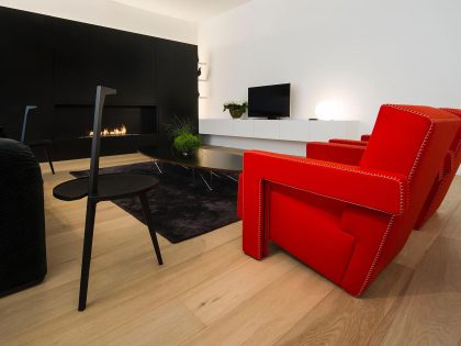 A Contemporary Apartment with Shades of Red and Black Furniture in Mortsel, Belgium by Filip Deslee (3)