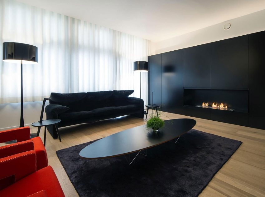 A Contemporary Apartment with Shades of Red and Black Furniture in Mortsel, Belgium by Filip Deslee (4)