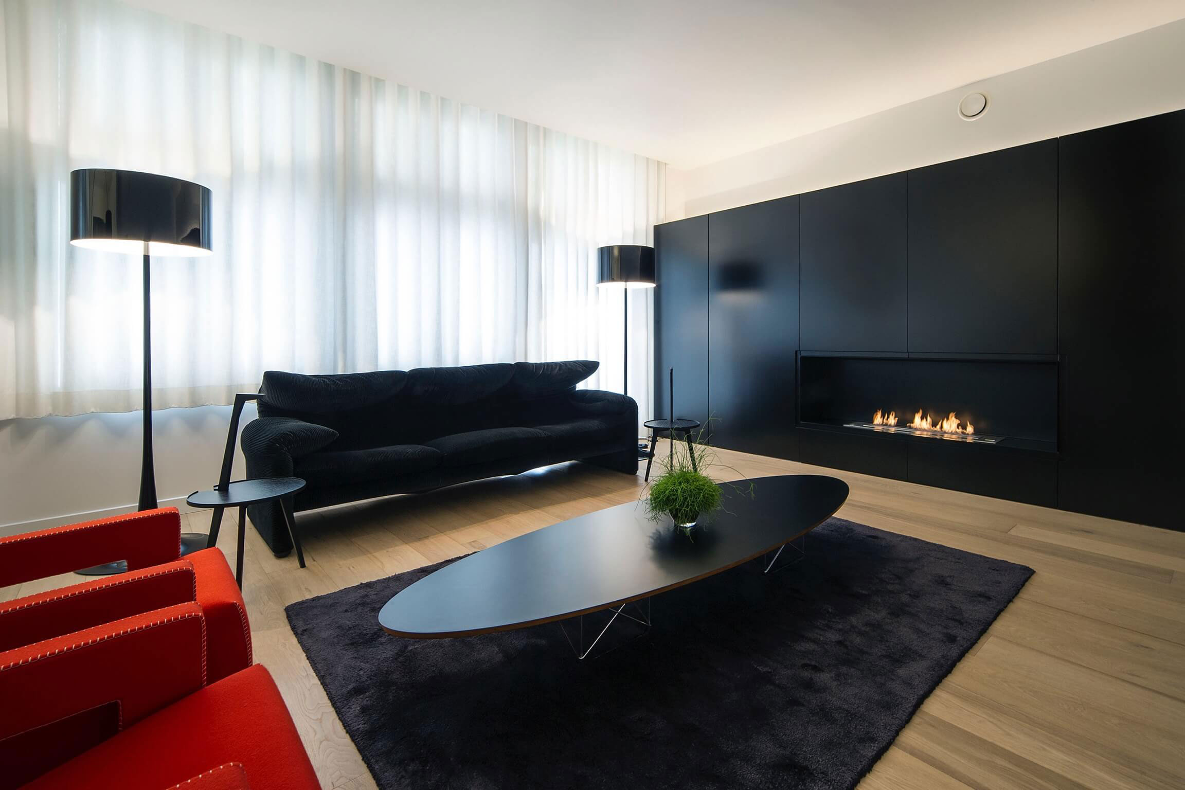 A Contemporary Apartment with Shades of Red and Black Furniture in Mortsel, Belgium by Filip Deslee (4)