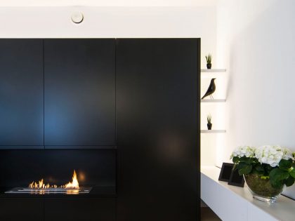 A Contemporary Apartment with Shades of Red and Black Furniture in Mortsel, Belgium by Filip Deslee (5)