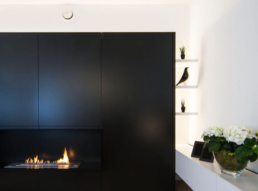 A Contemporary Apartment with Shades of Red and Black Furniture in Mortsel, Belgium by Filip Deslee (5)