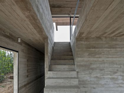 A Contemporary Concrete Home Made of Three Stacked Volumes in La Costa Partido by Luciano Kruk Arquitectos (10)
