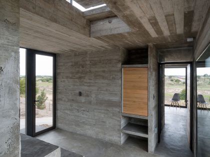A Contemporary Concrete Home Made of Three Stacked Volumes in La Costa Partido by Luciano Kruk Arquitectos (11)