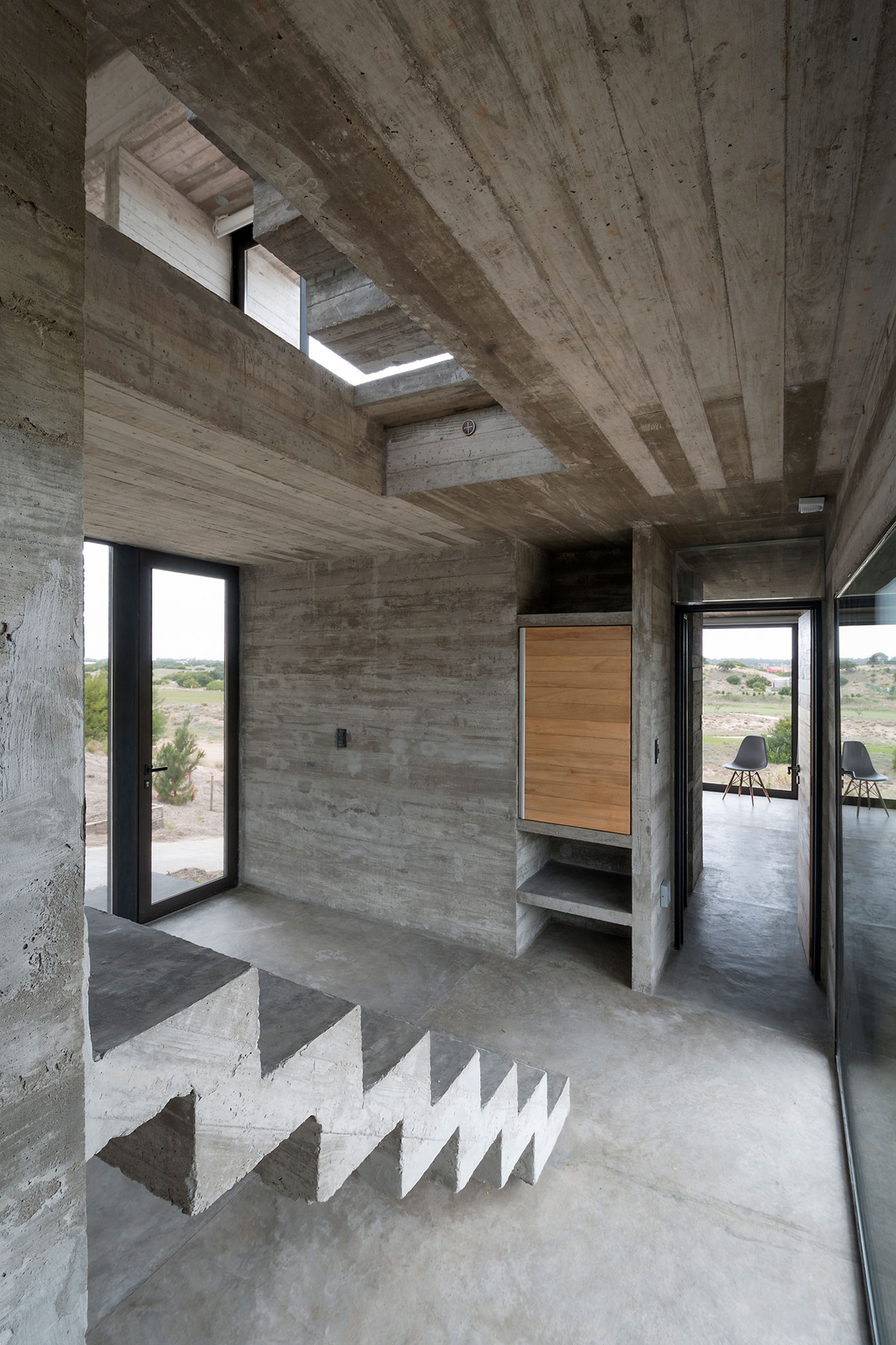 A Contemporary Concrete Home Made of Three Stacked Volumes in La Costa Partido by Luciano Kruk Arquitectos (11)