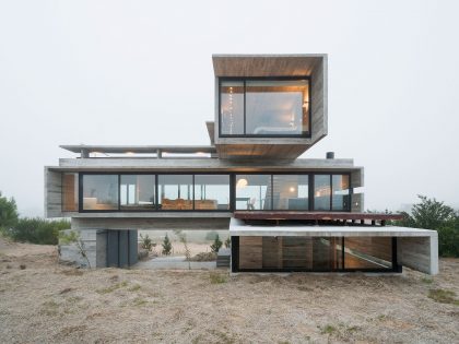 A Contemporary Concrete Home Made of Three Stacked Volumes in La Costa Partido by Luciano Kruk Arquitectos (12)