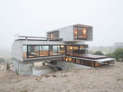 A Contemporary Concrete Home Made of Three Stacked Volumes in La Costa Partido by Luciano Kruk Arquitectos (13)