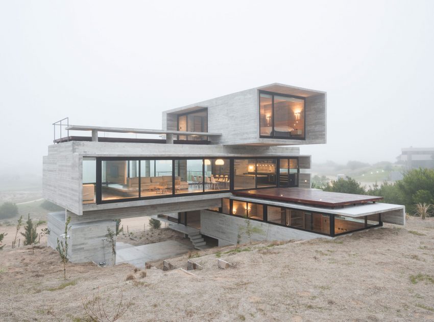 A Contemporary Concrete Home Made of Three Stacked Volumes in La Costa Partido by Luciano Kruk Arquitectos (13)