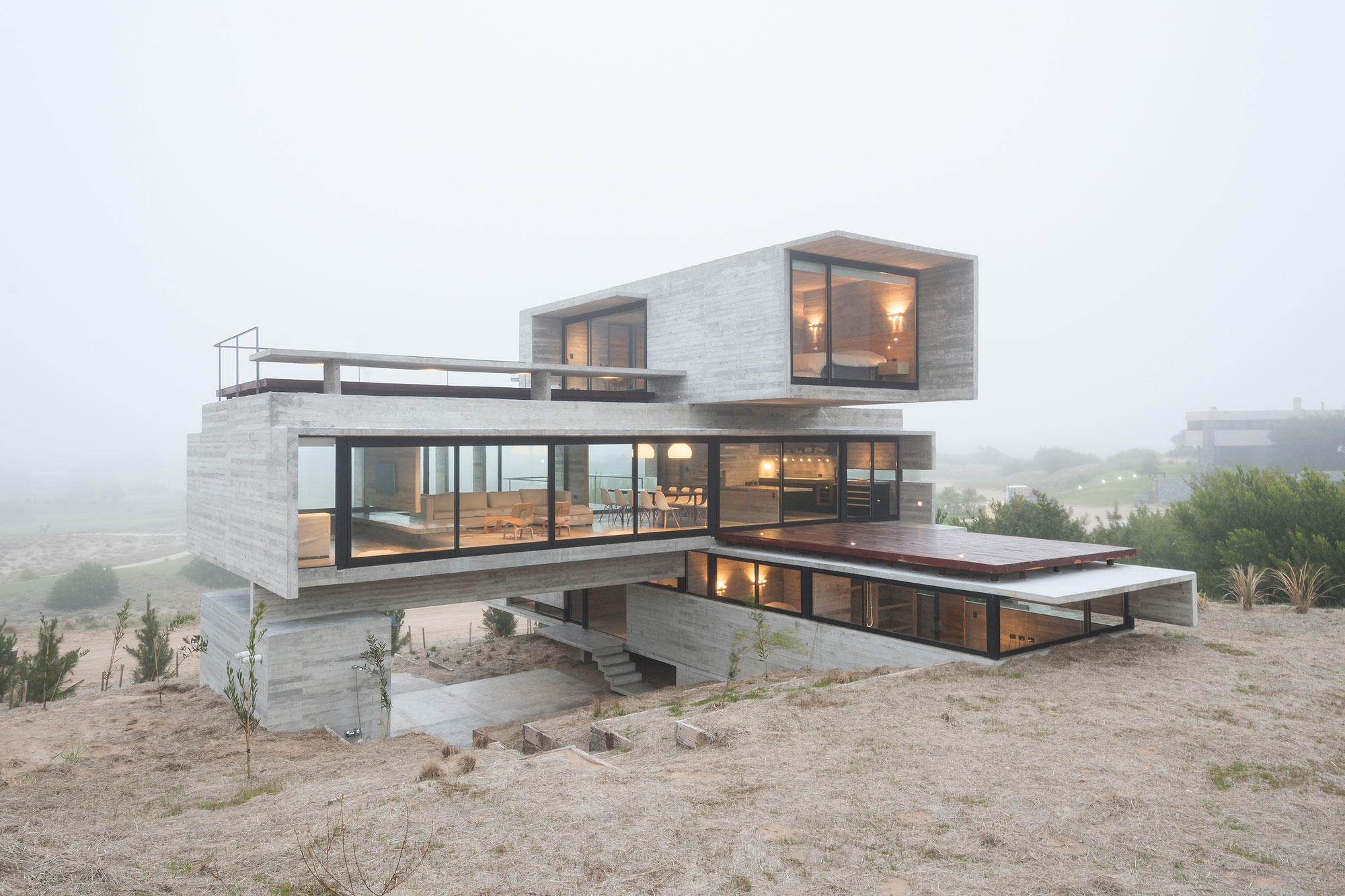 A Contemporary Concrete Home Made of Three Stacked Volumes in La Costa Partido by Luciano Kruk Arquitectos (13)
