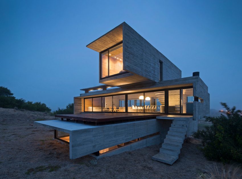 A Contemporary Concrete Home Made of Three Stacked Volumes in La Costa Partido by Luciano Kruk Arquitectos (17)