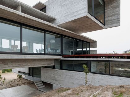 A Contemporary Concrete Home Made of Three Stacked Volumes in La Costa Partido by Luciano Kruk Arquitectos (2)