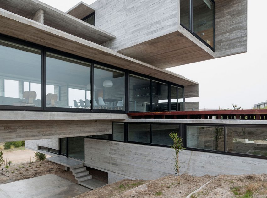 A Contemporary Concrete Home Made of Three Stacked Volumes in La Costa Partido by Luciano Kruk Arquitectos (2)