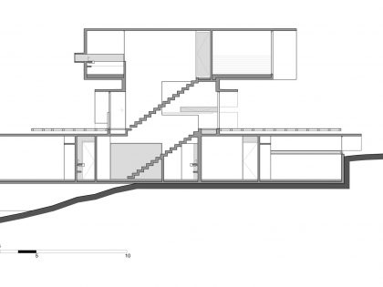 A Contemporary Concrete Home Made of Three Stacked Volumes in La Costa Partido by Luciano Kruk Arquitectos (26)