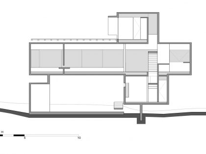 A Contemporary Concrete Home Made of Three Stacked Volumes in La Costa Partido by Luciano Kruk Arquitectos (27)