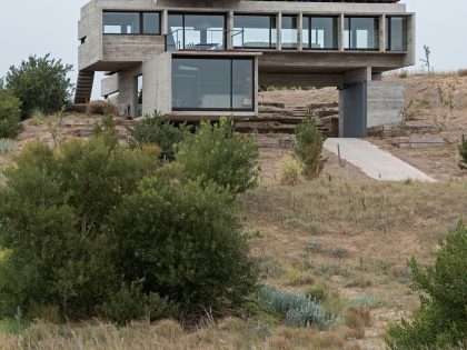 A Contemporary Concrete Home Made of Three Stacked Volumes in La Costa Partido by Luciano Kruk Arquitectos (3)