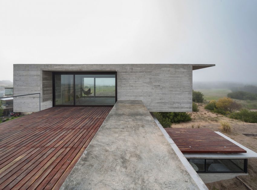 A Contemporary Concrete Home Made of Three Stacked Volumes in La Costa Partido by Luciano Kruk Arquitectos (4)
