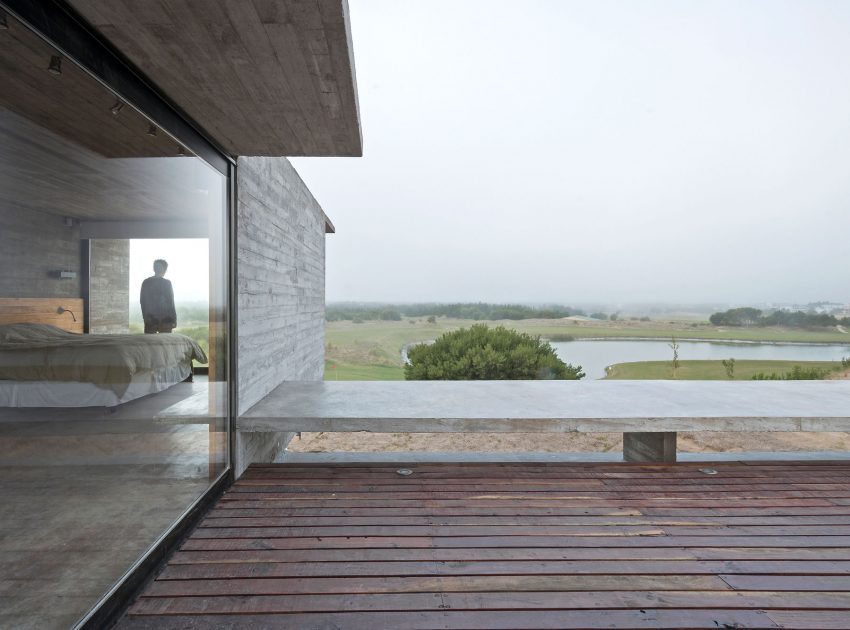 A Contemporary Concrete Home Made of Three Stacked Volumes in La Costa Partido by Luciano Kruk Arquitectos (6)