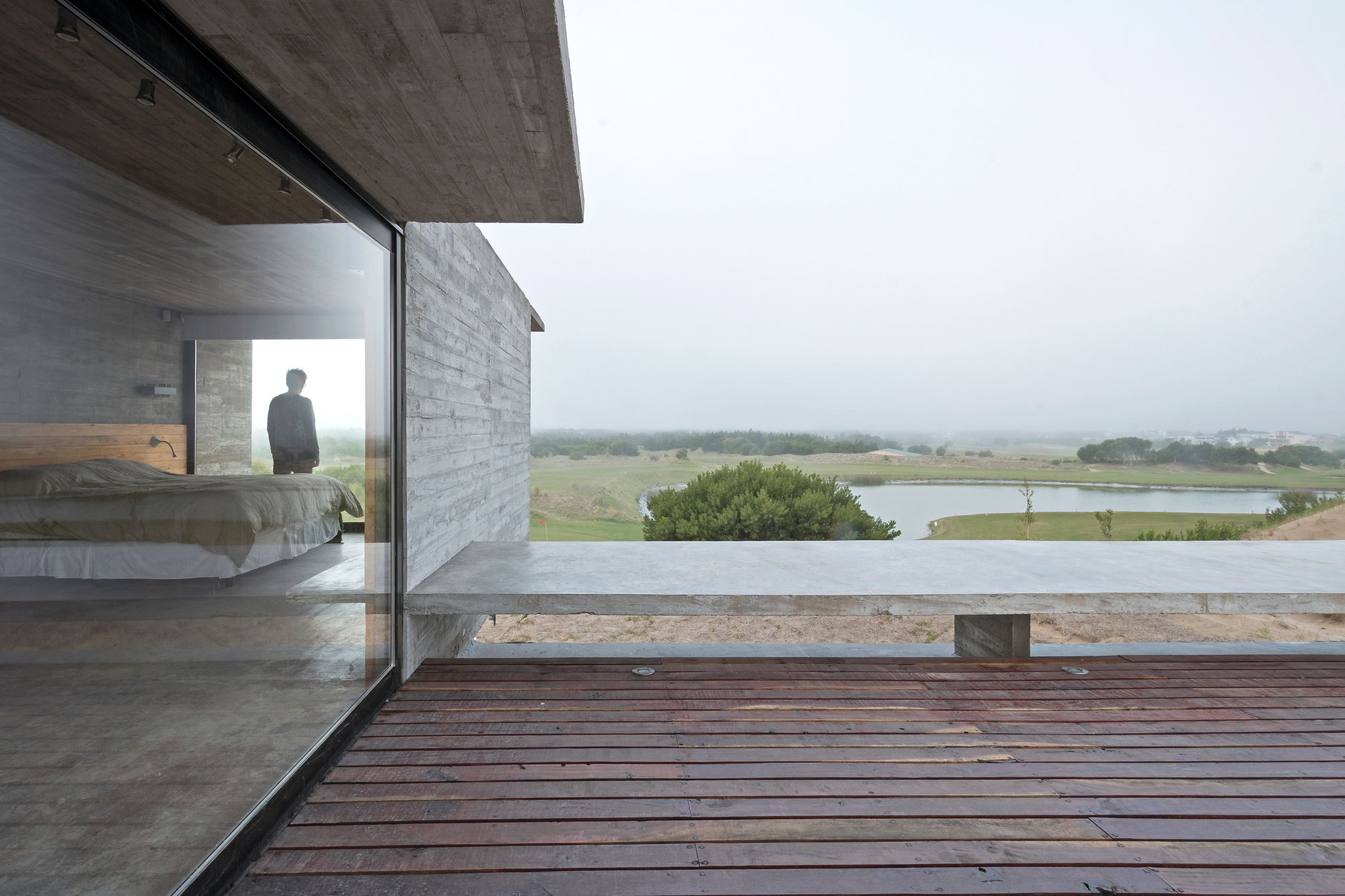 A Contemporary Concrete Home Made of Three Stacked Volumes in La Costa Partido by Luciano Kruk Arquitectos (6)