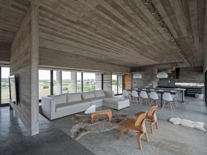 A Contemporary Concrete Home Made of Three Stacked Volumes in La Costa Partido by Luciano Kruk Arquitectos (8)