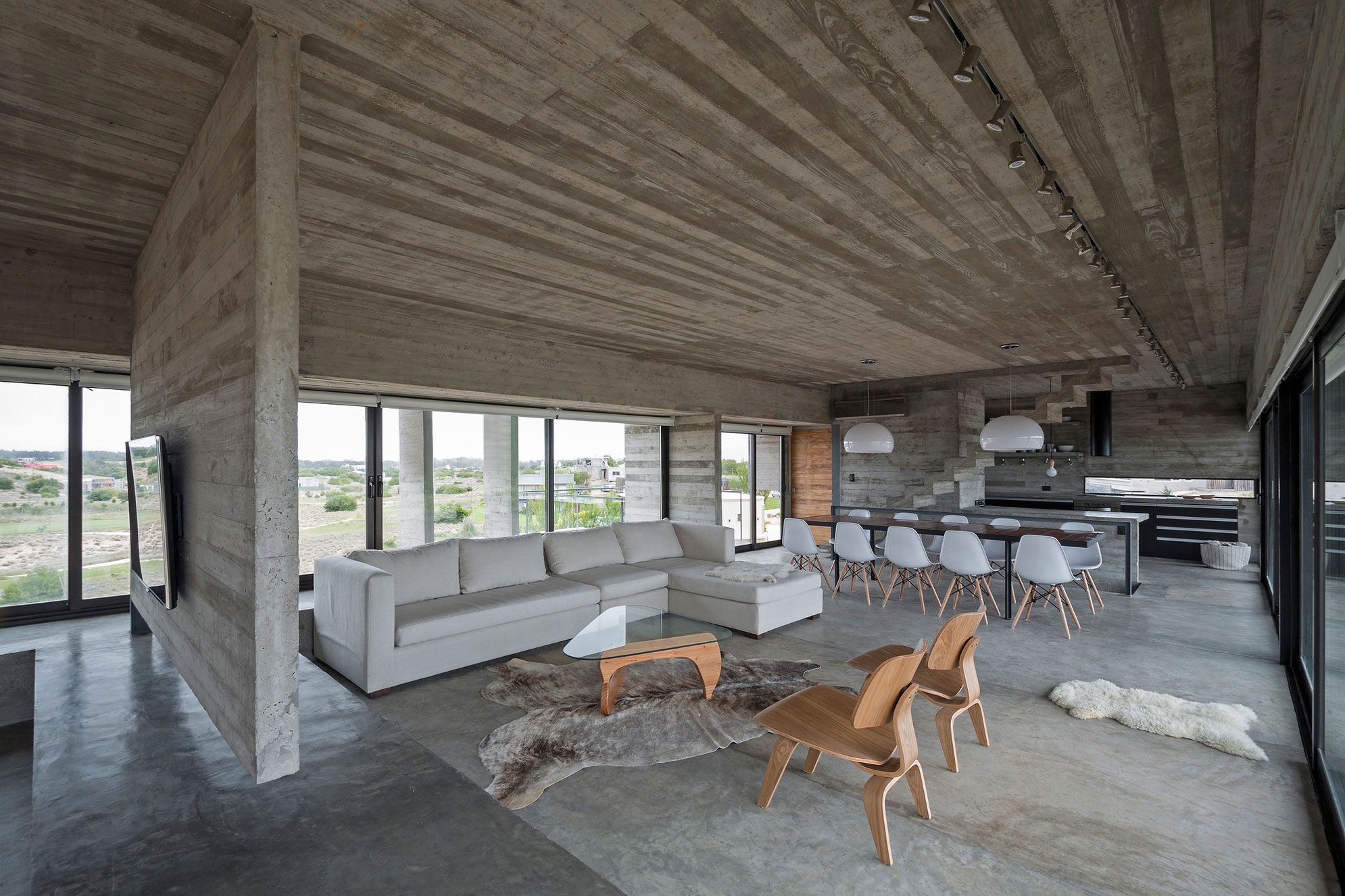 A Contemporary Concrete Home Made of Three Stacked Volumes in La Costa Partido by Luciano Kruk Arquitectos (8)