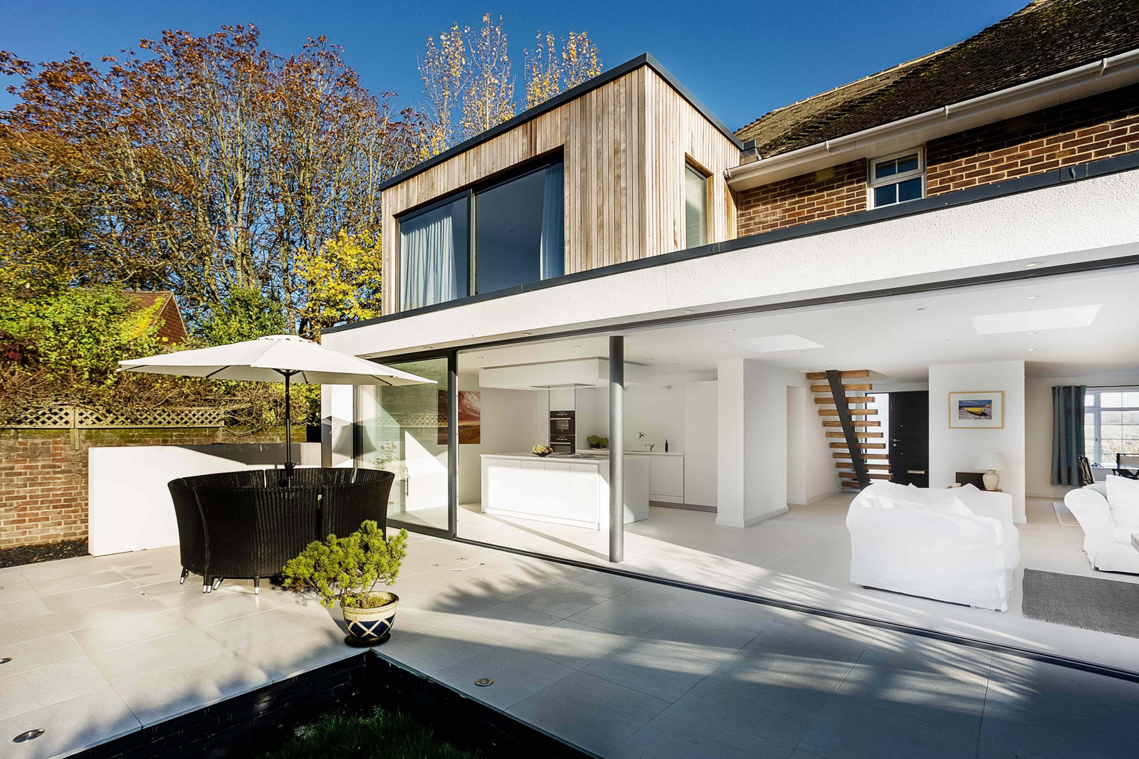 A Contemporary Extensions to a Luminous House with Brick Façade in Crawley by Adam Knibb Architects (1)