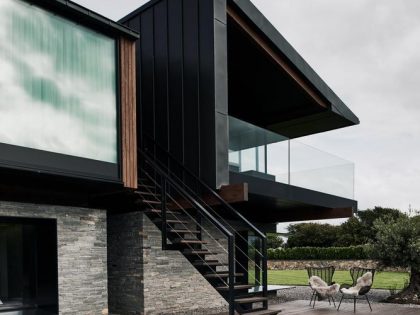 A Contemporary Family Home with a Pair of Mono-Pitched Volumes in South Wales by Hyde + Hyde Architects (4)