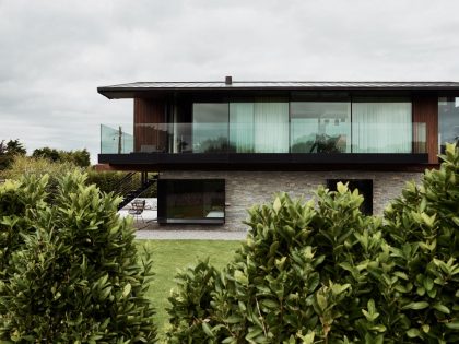 A Contemporary Family Home with a Pair of Mono-Pitched Volumes in South Wales by Hyde + Hyde Architects (6)