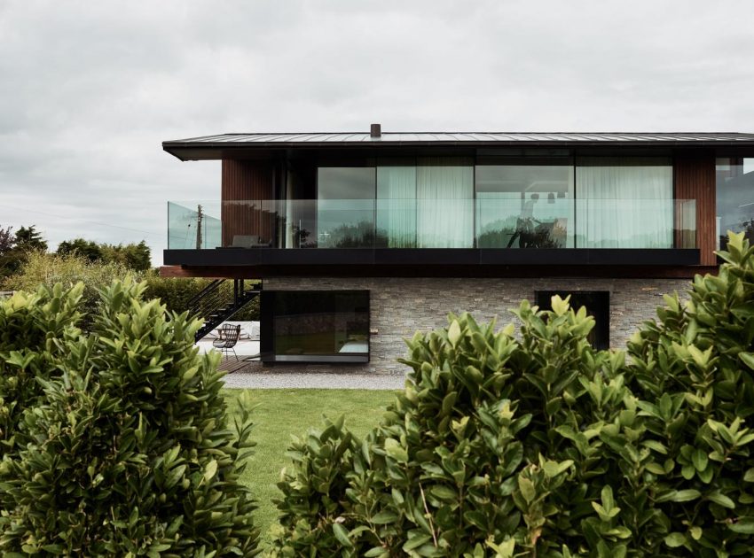 A Contemporary Family Home with a Pair of Mono-Pitched Volumes in South Wales by Hyde + Hyde Architects (6)