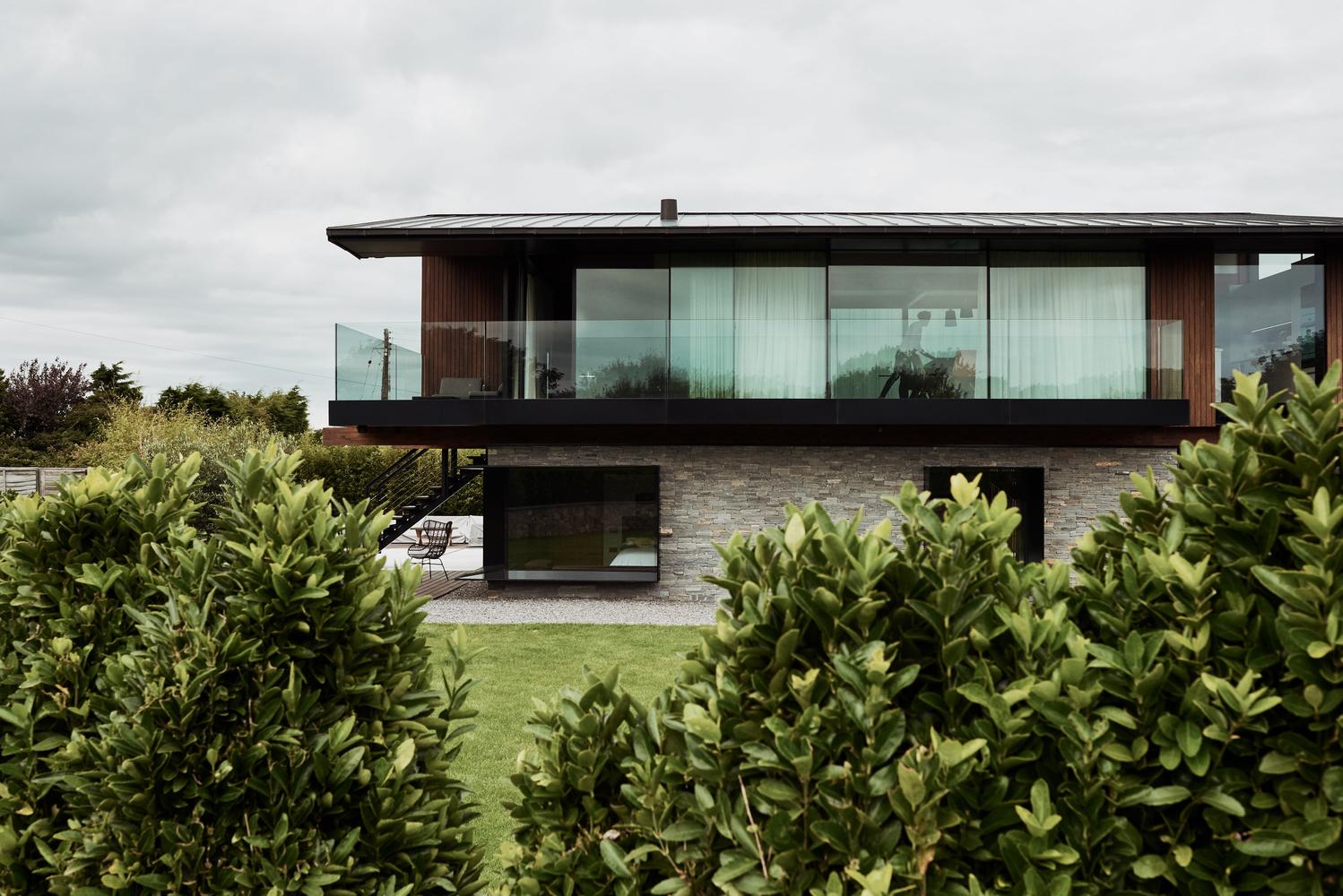 A Contemporary Family Home with a Pair of Mono-Pitched Volumes in South Wales by Hyde + Hyde Architects (6)