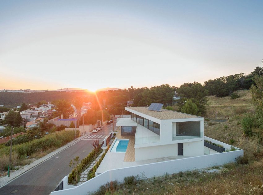 A Stunning Contemporary Hillside Home Overlooking the Atlantic Ocean in Dafundo by JPS Atelier (1)