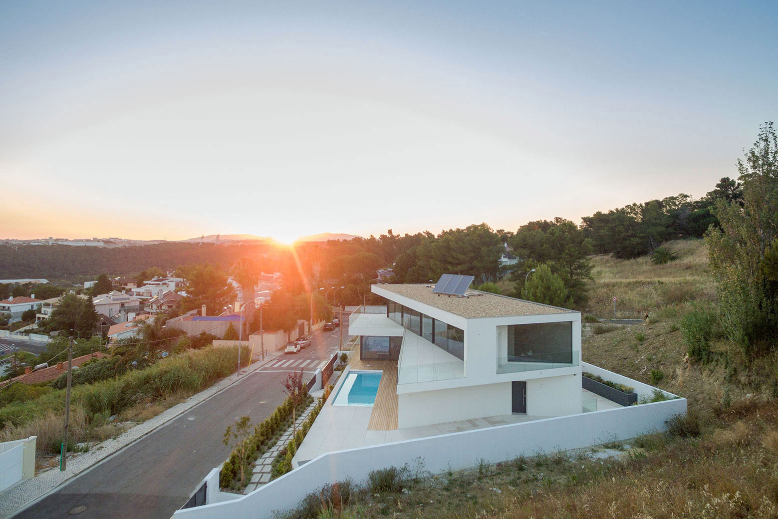 A Stunning Contemporary Hillside Home Overlooking the Atlantic Ocean in Dafundo by JPS Atelier (1)