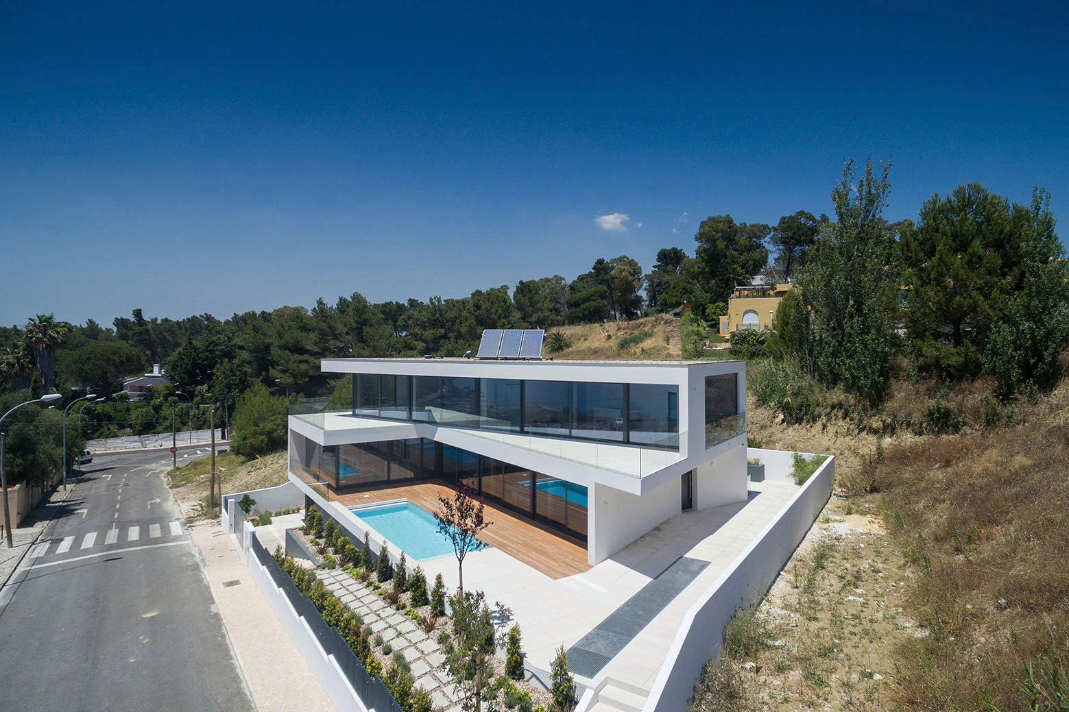 A Stunning Contemporary Hillside Home Overlooking the Atlantic Ocean in Dafundo by JPS Atelier (2)