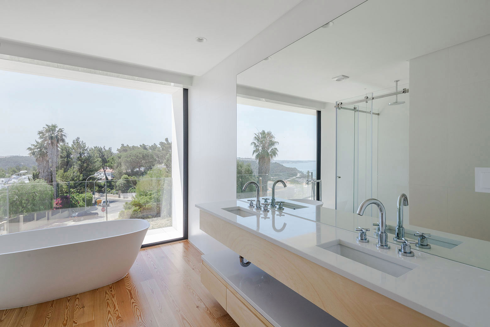 A Stunning Contemporary Hillside Home Overlooking the Atlantic Ocean in Dafundo by JPS Atelier (21)