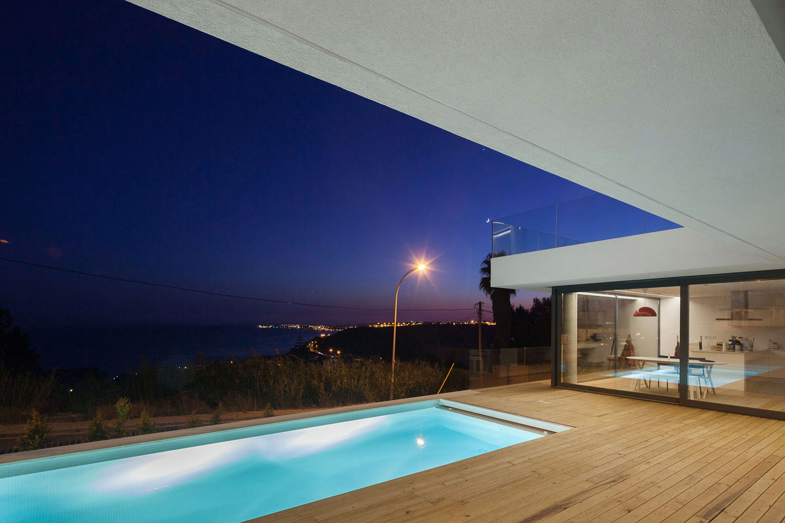 A Stunning Contemporary Hillside Home Overlooking the Atlantic Ocean in Dafundo by JPS Atelier (22)