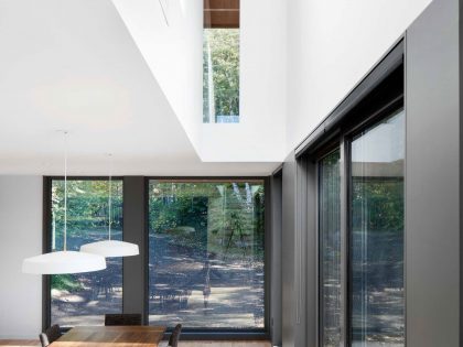 A Contemporary Home Combines Wood and Steel Panelling in Rimouski by NatureHumaine (11)