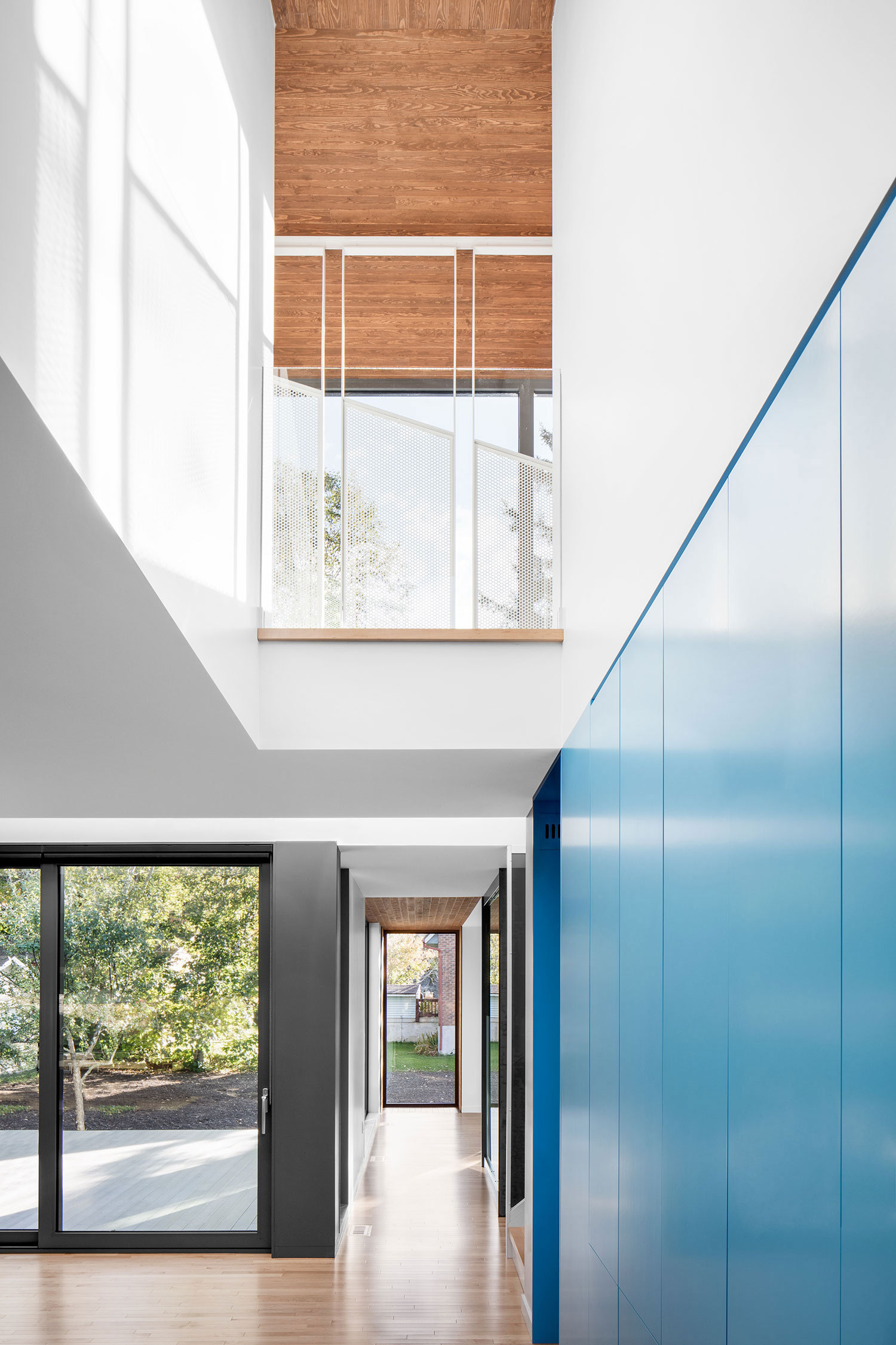 A Contemporary Home Combines Wood and Steel Panelling in Rimouski by NatureHumaine (12)